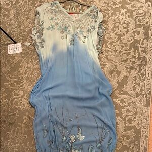 Free people brand new, never worn. Stars and moon dress!